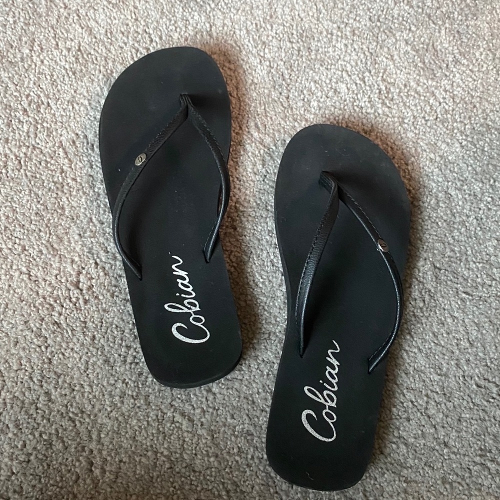 Cobian black flip flops